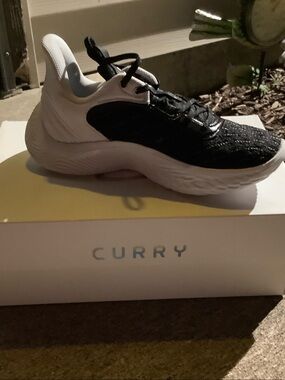 Black and White Performance Sneakers men’s size 5.5 women’s size 7